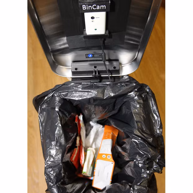 Five households have signed up for a Newcastle University programme that posts photographs of every item placed in a rubbish bin onto Facebook in a bid to raise consciousness about recycling efforts. It uses a sensor and a camera phone to record the image each time the lid is shut. Households that participate will be rated on how efficiently they recycle.