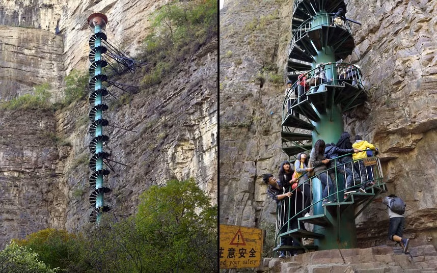 Những hình ảnh ấn tượng trong tuần ảnh 8 A 300ft spiral staircase has been installed on the cliff face of the Taihang Mountains in Linzhou to offer the thrill of mountaineering without the danger. But senior climbers beware - you have to be under 60 to be allowed on the staircase.