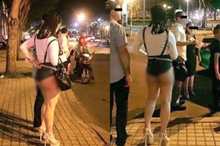 Cô gái mặc quần soóc lộ nguyên vòng 3 trên phố
