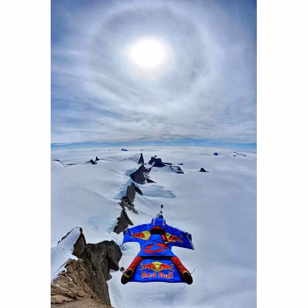 Russian extreme sports athlete Valery Rozov performs the first ever wingsuit jump from the Ulvetanna, a 2,931-metre high mountain in the Drygalski mountains in east Antarctica. After a 45-second flight Rozov landed with a parachute on the glacier.