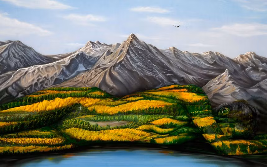 At first glance, this may look like a landscape painted on canvas. But on closer inspection, the rolling green hills are actually painted onto a woman’s naked body. Craig Tracy spent hours painstakingly painting the woman’s curves to create the optical illusion.