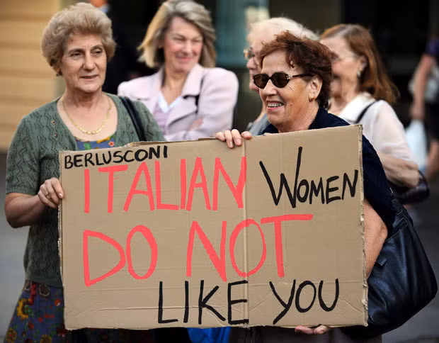 Italian women gather in Sydney to mark the 100th International Women’s Day with a protest highlighting the sex scandal surrounding Italian Prime Minister Silvio Berlusconi