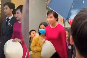 Viên Minh luôn cầm chiếc nón lá truyền thống sánh đôi bên Công Phượng