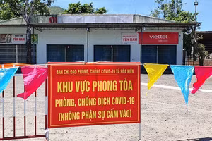 Phong tỏa quán cơm Yến Nam nơi bệnh nhân 13960 làm chủ. Ảnh minh họa: Thái Bình.