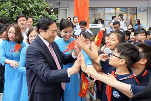 Thủ tướng Chính phủ Phạm Minh Chính tới dự Lễ Khai giảng năm học 2022 - 2023 tại Trường Tiểu học Đoàn Thị Điểm (quận Nam Từ Liêm, Hà Nội) sáng 5/9/2022.