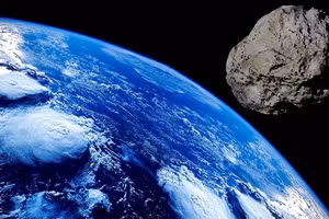 Thiên thạch và Trái đất. (Ảnh: Sputnik).