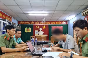 Anh B.M.T. làm việc với cơ quan công an.