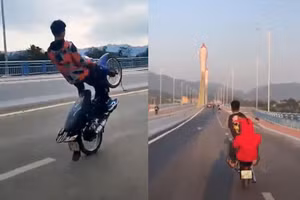 Hai nam thanh niên “bốc đầu” xe máy trên cầu bị xử lý
