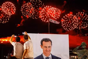 Pháo hoa mừng chiến thắng của ông Assad.