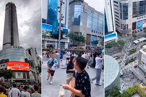 Tòa nhà SEG Plaza rung lắc khiến nhiều người tháo chạy.
