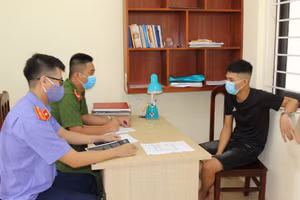 Bùi Huy Lực tại cơ quan công an.