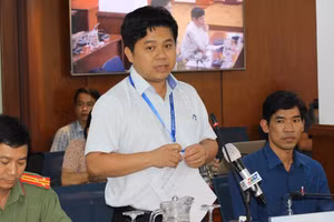 Ông Hồ Tấn Minh thông tin tại buổi họp báo.