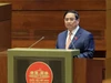 Thủ tướng Chính phủ Phạm Minh Chính trình bày Báo cáo tại phiên khai mạc Kỳ họp thứ 10, Quốc hội khoá XV (sáng 20/10) - Ảnh: VGP/Nhật Bắc.