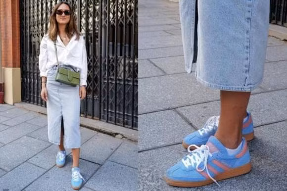 Áo sơ mi trắng đơn giản và kết hợp cùng chân váy denim cổ điển, thể hiện phong cách truyền thống. Các bạn có thể kết hợp với chiếc túi màu quả hồ trăn để tăng thêm sức sống và điểm nhấn cho tổng thể. Bí quyết diện áo sơ mi cá tính, quyến rũ