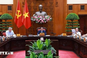 Thủ tướng Phạm Minh Chính chủ trì cuộc họp với các bộ, ngành để chuẩn bị đàm phán thương mại với Hoa Kỳ. (Ảnh: Dương Giang/TTXVN)