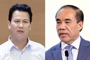 Ông Đặng Quốc Khánh và ông Chẩu Văn Lâm. (Nguồn: TTXVN)