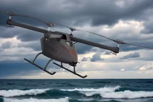 Một máy bay UAV Piasecki KARGO II bay thấp trên vùng biển động dưới bầu trời nhiều mây. Ảnh: Piasecki Aircraft