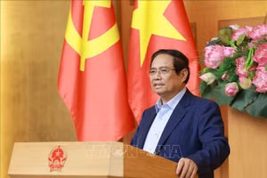 Thủ tướng Phạm Minh Chính phát biểu tại buổi làm việc với Ban Nghiên cứu phát triển kinh tế tư nhân (Ban IV). (Ảnh: Dương Giang/TTXVN)