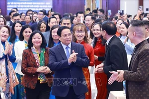 Thủ tướng Phạm Minh Chính dự Hội nghị tổng kết đề án hỗ trợ phụ nữ khởi nghiệp và biểu dương điển hình hợp tác xã do phụ nữ tham gia quản lý năm 2025. Ảnh: Dương Giang/TTXVN 