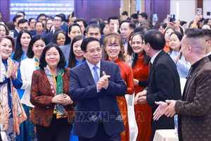 Thủ tướng Phạm Minh Chính dự Hội nghị tổng kết đề án hỗ trợ phụ nữ khởi nghiệp và biểu dương điển hình hợp tác xã do phụ nữ tham gia quản lý năm 2025. Ảnh: Dương Giang/TTXVN 