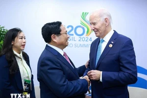 Thủ tướng Phạm Minh Chính gặp Tổng thống Hoa Kỳ Joe Biden tại Hội nghị thượng đỉnh G20. (Ảnh: Dương Giang/TTXVN) 