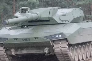 Nguyên mẫu xe tăng chiến đấu chủ lực KNDS Leopard 2A-RC 3.0 PT02 di chuyển qua địa hình lầy lội trong các cuộc thử nghiệm tại Đức.