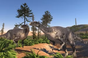 Hai cá thể Plateosaurus trong vùng đất khô cằn vào cuối kỷ Trias.