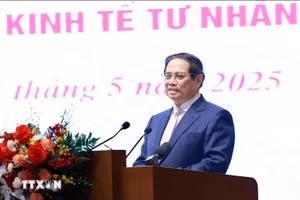 Thủ tướng Phạm Minh Chính phát biểu tại cuộc tọa đàm với doanh nghiệp về phát triển kinh tế tư nhân. (Ảnh: Dương Giang/TTXVN).