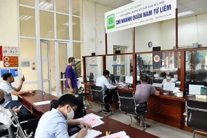 Bộ Nông nghiệp và Môi trường đề nghị các địa phương sắp xếp các Chi nhánh Văn phòng đăng ký đất đai trên địa bàn cấp huyện hiện nay thành các Chi nhánh Văn phòng đăng ký đất đai đặt tại đơn vị hành chính cấp xã hoặc khu vực liên xã, phường, bảo đảm thực hiện tốt công tác quản lý đất đai. Ảnh minh họa.