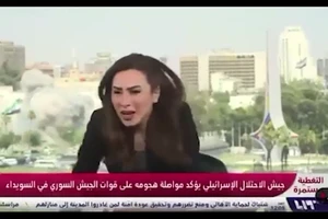 Israel không kích Tổng hành dinh, truyền hình Syria ghi lại khoảnh khắc nổ lớn