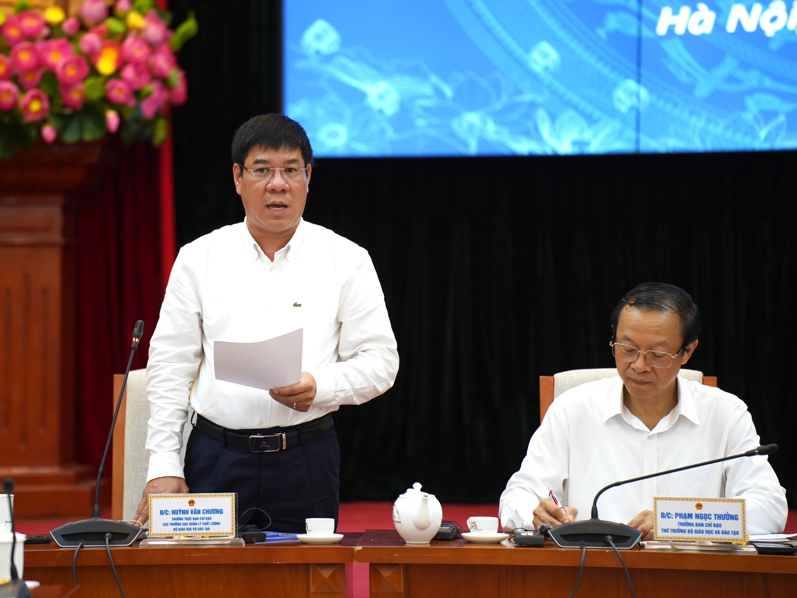 GS.TS Huỳnh Văn Chương - Cục trưởng Cục Quản lý chất lượng (Bộ GD&amp;ĐT) báo cáo tại buổi họp báo.