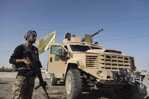 Chiến binh Lực lượng Dân chủ Syria (SDF) do Mỹ hậu thuẫn.