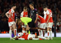 Chùm ảnh: Arsenal và Bayern Munich rượt đuổi tỷ số kịch tính