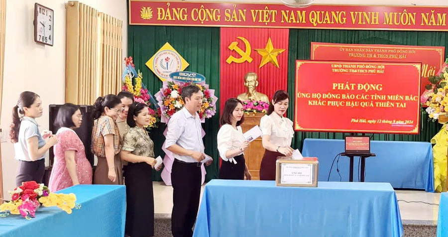 HS-QUANG-BINH-UNG-HO-3.jpg