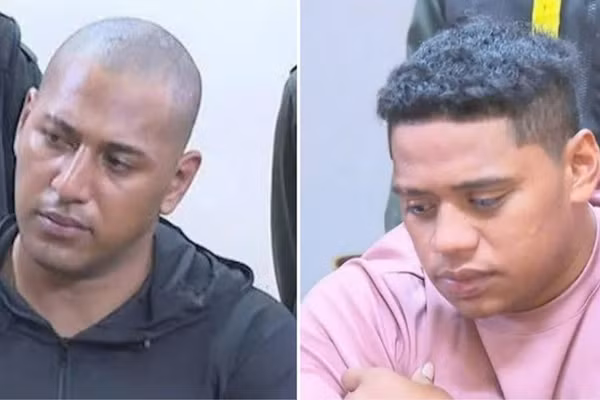 2 nghi phạm quốc tịch Samoan tại cơ quan điều tra. Ảnh: Công an TPHCM.