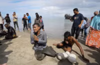 Chùm ảnh người tị nạn Rohingya liều mình đến Indonesia