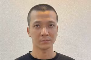 Nguyễn Lê Khôi bị công an bắt giữ.