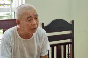 Lương Văn Sỏn tại cơ quan công an. Ảnh: CANA
