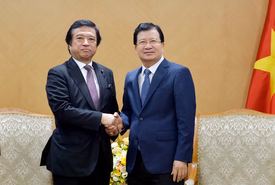 Phó Thủ tướng Trịnh Đình Dũng và Bộ trưởng Fukui Teru tại buổi tiếp