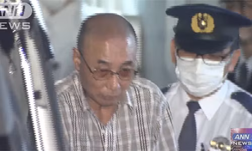 "Thánh móc túi"Kazutoshi Yamaguchi bị cảnh sát áp giải ở Tokyo hôm 21/5. Thánh móc túiKazutoshi Yamaguchi bị cảnh sát áp giải ở Tokyo hôm 21/5. Ảnh: ANN News