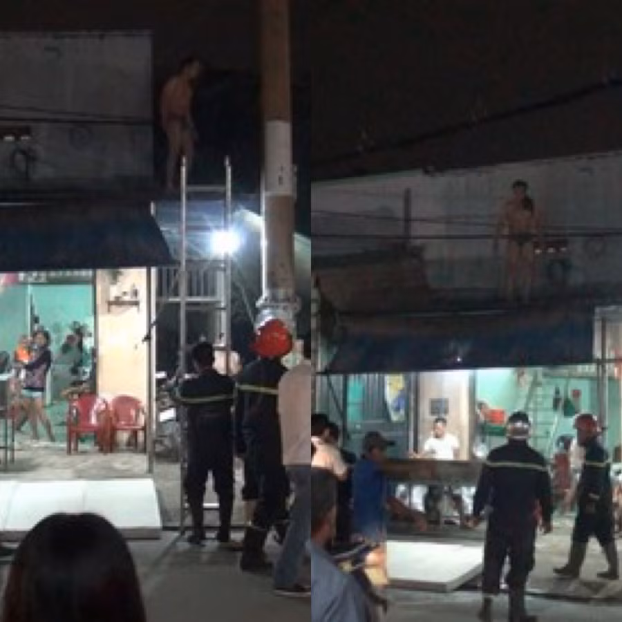Người đàn ông nghi ngáo đá, dùng kéo uy hiếp người thân rồi khỏa thân leo nóc nhà