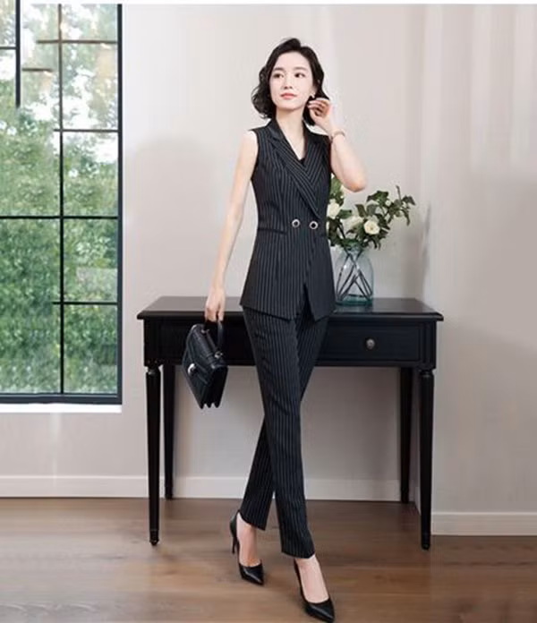 Các mẫu áo vest chuẩn mốt mùa thu giúp nàng công sở ghi điểm tuyệt đối ảnh 7 cac mau ao vest chuan mot giup cac nang cong so ghi diem tuyet doi trong mat dong nghiep - 8