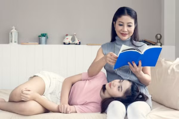 happy-asian-daughter-lie-down-260nw-693613435.jpg