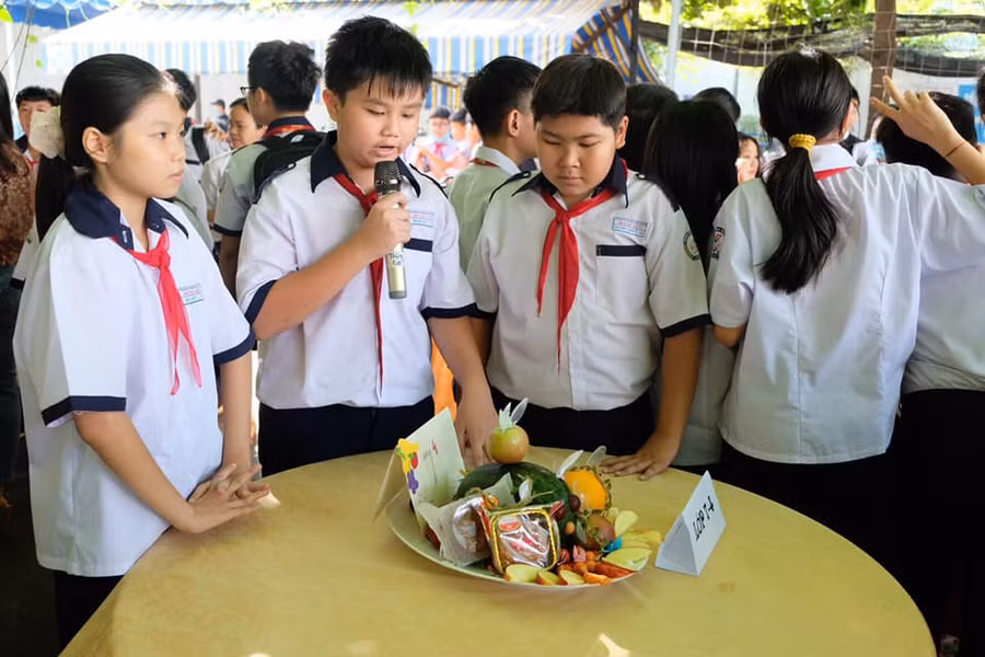 Học sinh Trường THCS Minh Đức trình bày về ý nghĩa của ngày Tết Trung thu. Ảnh minh họa: NTCC