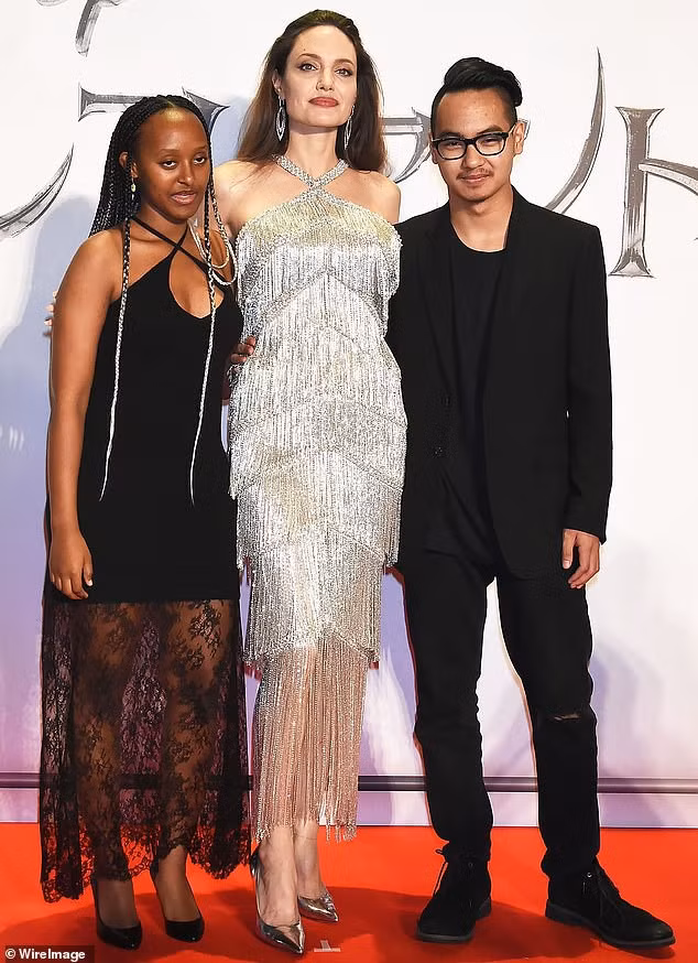 angelina jolie dep hut mat, vui ve hoi ngo con trai maddox o nhat ban hinh 2
