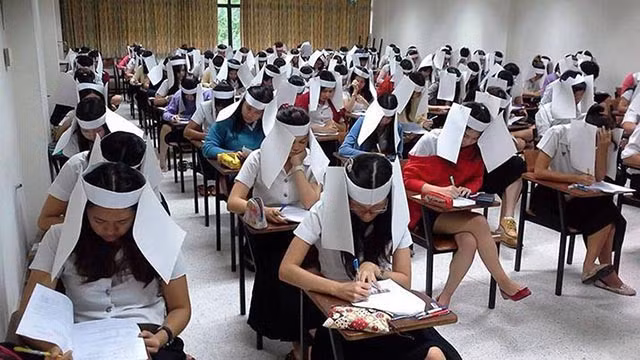 Tổng hợp những cách chống gian lận thi cử bá đạo trên thế giới - Ảnh 4. Tổng hợp những cách chống gian lận thi cử bá đạo trên thế giới - Ảnh 4.