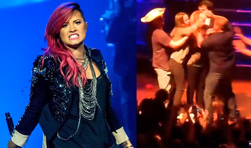 Năm 2012, Demi Lovato cũng bị tấn công trên sân khấu Paraguay. Trước cảnh hỗn loạn, cô chạy về phía cảnh gà, chờ đợi sự việc được giải quyết trước khi quay lại kết thúc show diễn. nhung-sao-ngoai-tung-bi-tan-cong-khi-dang-bieu-dien-1