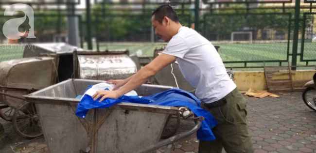 Người phát hiện bé trai sơ sinh trong thùng rác giữa trời mưa lớn: Suýt chút nữa là thằng bé bị chôn sống rồi-1
