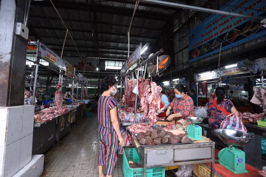 Người dân đi chợ. Ảnh minh họa. 