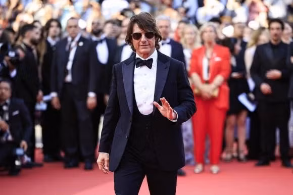 Ở tuổi U70, nam tài tử đình đám Tom Cruise xuất hiện 'cực ngầu' với kính đen và suit lịch lãm tại thảm đỏ LHP Cannes 2025 ngày 2. cannes-10.jpg